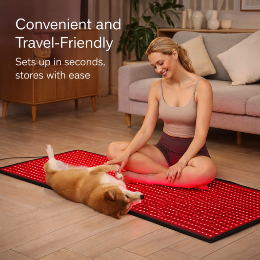 Woman and dog on the Nurtura Red and Infrared Light Therapy Mat in a living room setting